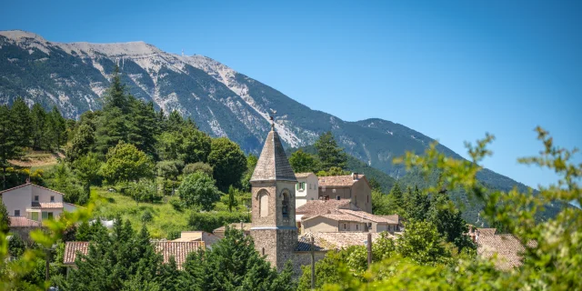 View of the church bell in the village of Savoillans, with Mont Ventoux in the background